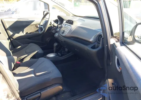 2009 Honda Fit Sport из США, поврежденный, VIN JHMGE88499S049462